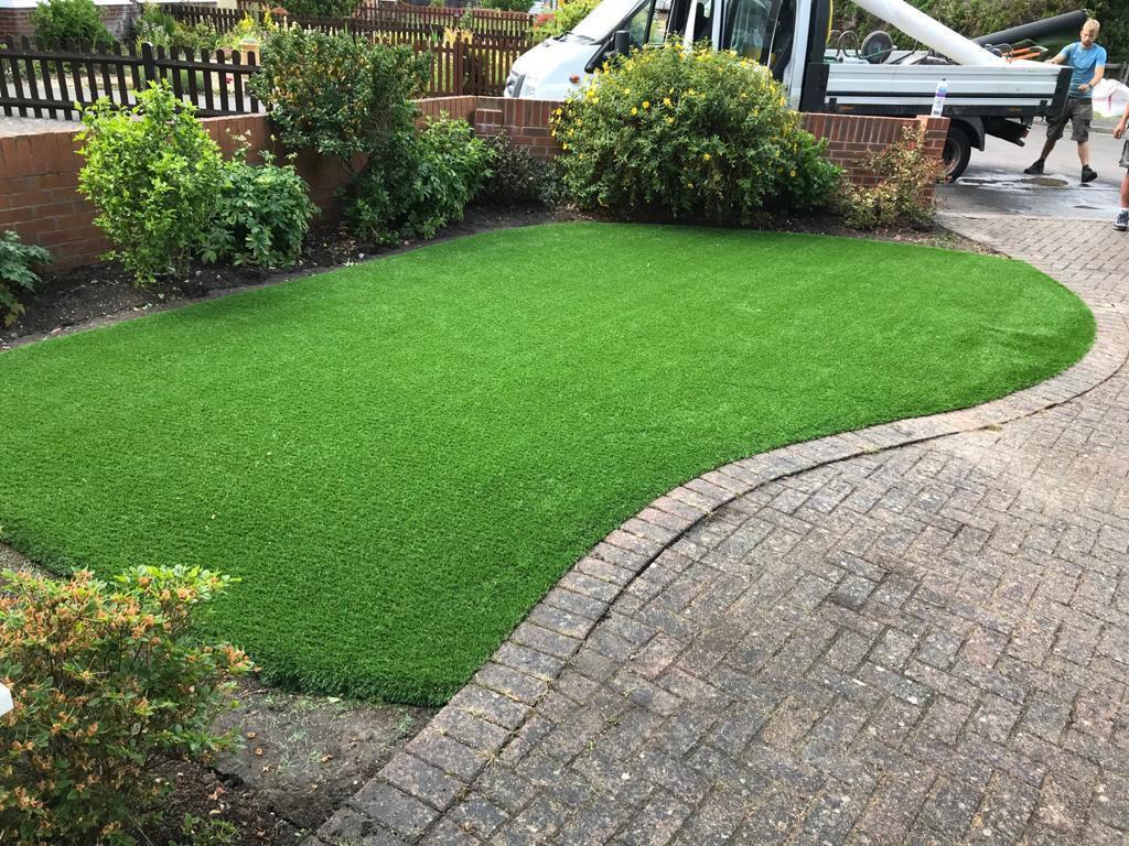 Artificial Grass with Block Paving