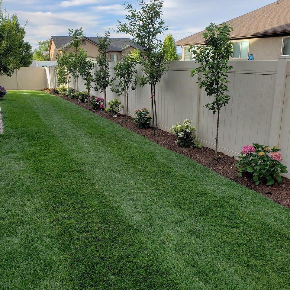 Artificial Grass with White Fence